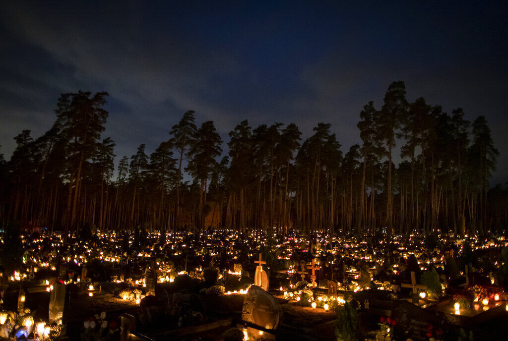 APTOPIX Virus Outbreak Lithuania All Saint Days